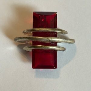 Large 2” Red and silver colored Pendant.